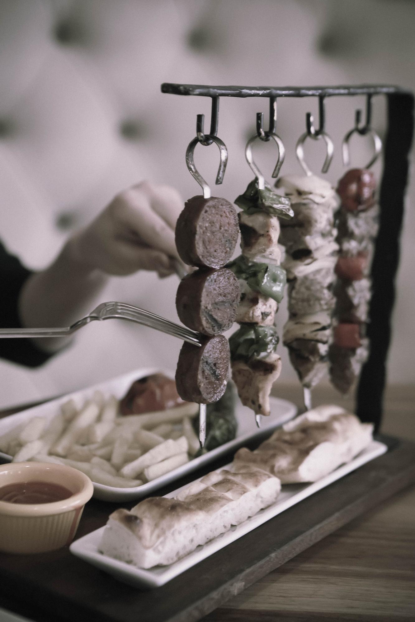 tray of curated appetizers with herbs